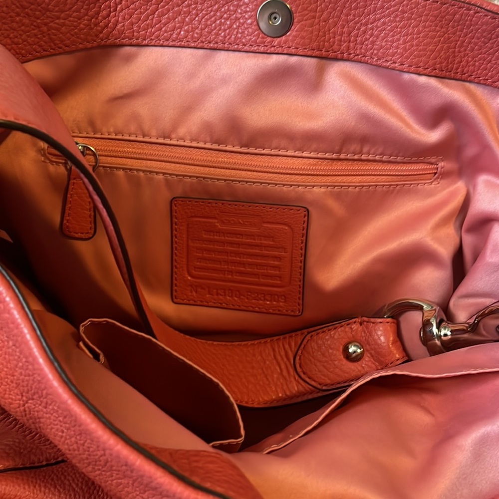 Coral large coach hobo purse with silver hardware.  Coral trim inside to match - Picture 3 of 4